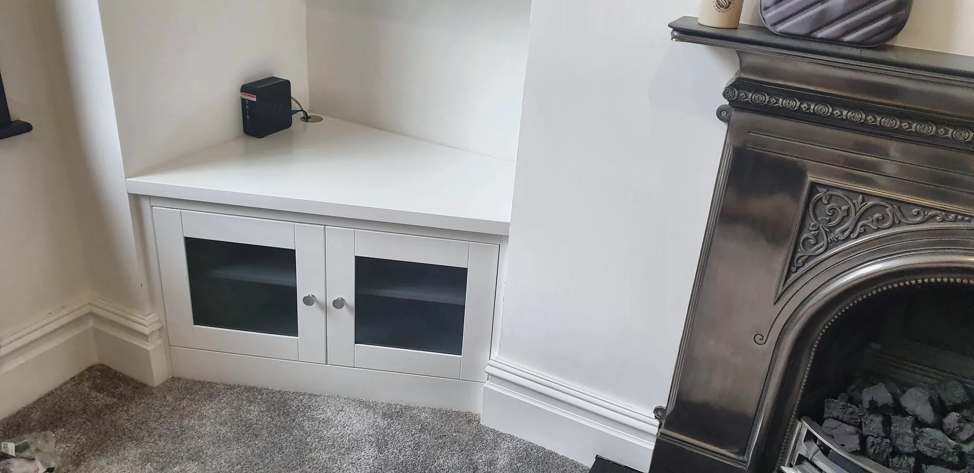 Glazed cabinet doors in the alcove