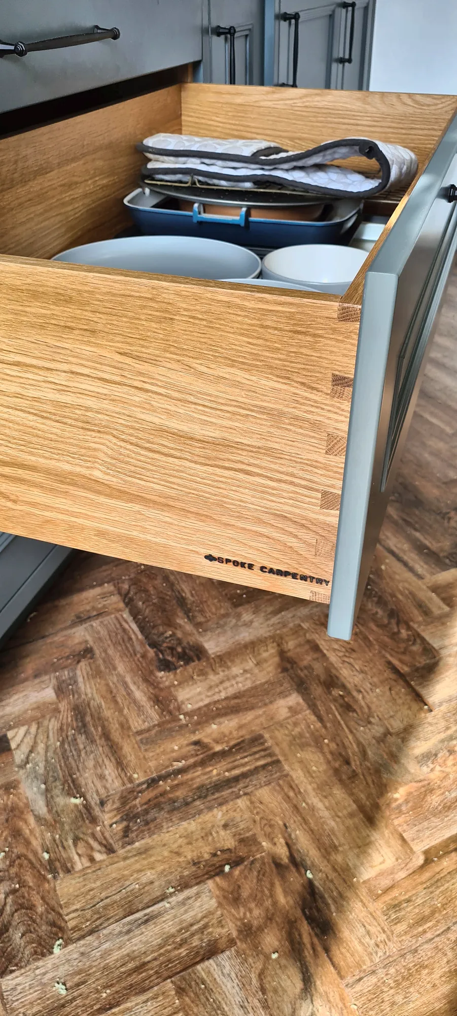 Dovetailed oak drawer, branded inside