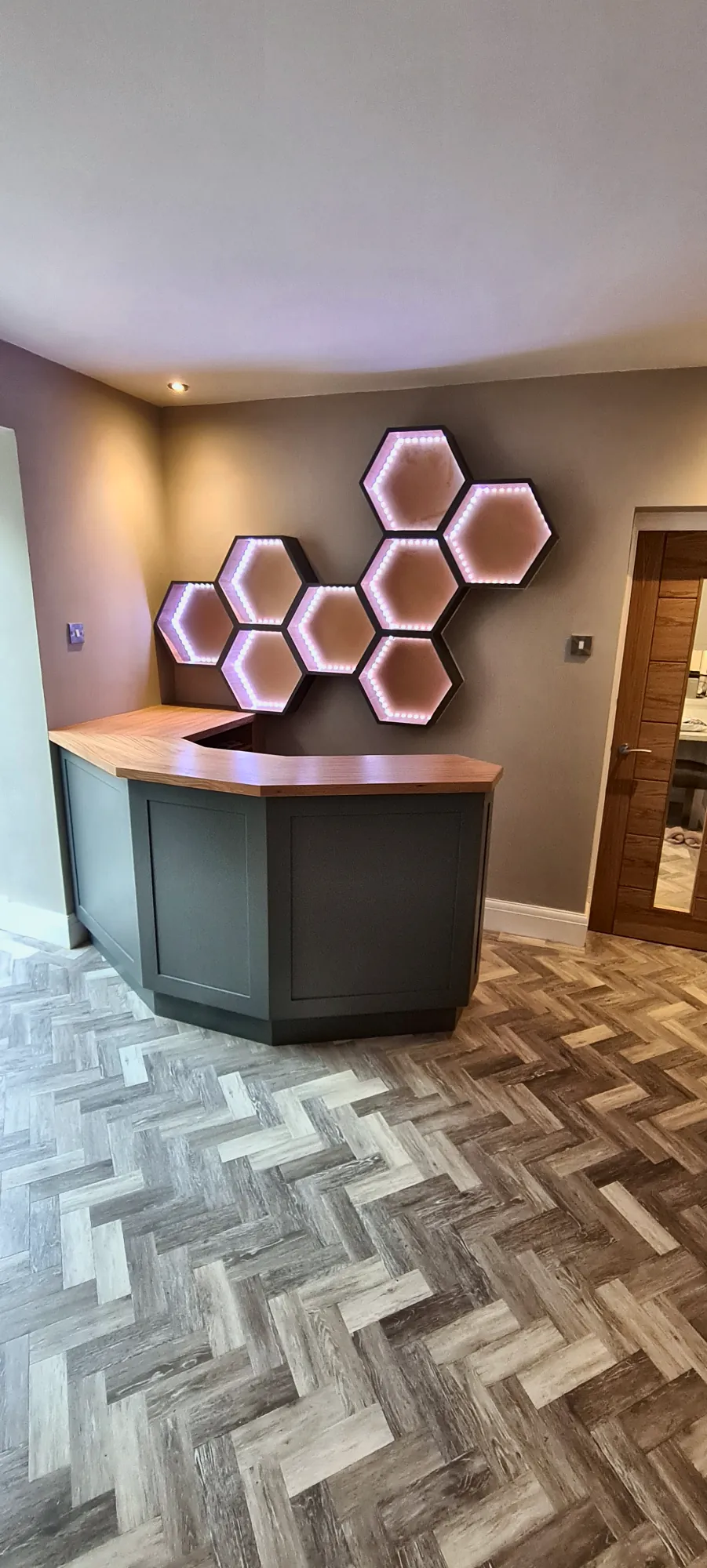 Honeycomb shelves lit in soft white