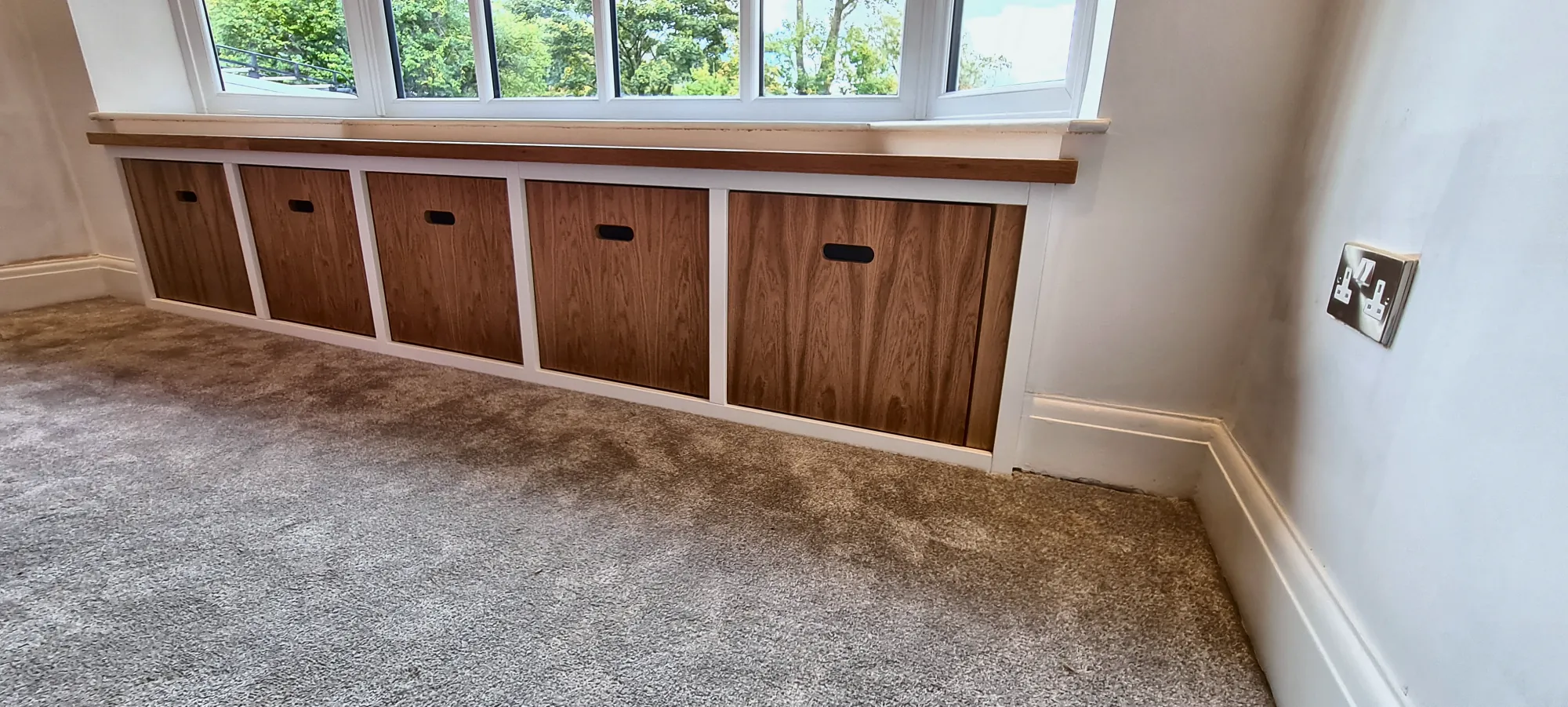 Bay window seat with oak storage drawers