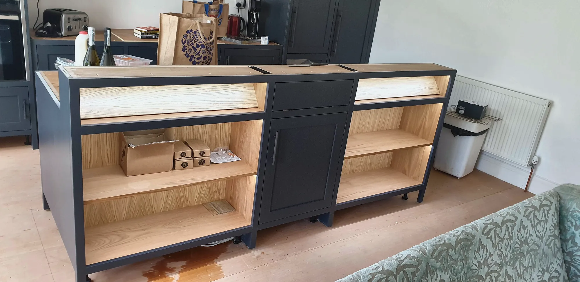 Island with lit open shelving
